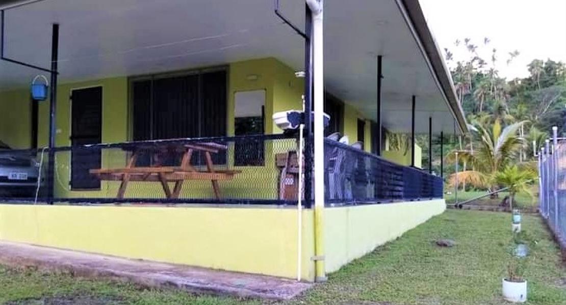 Savusavu house near creek, Vanua Levu, Fiji